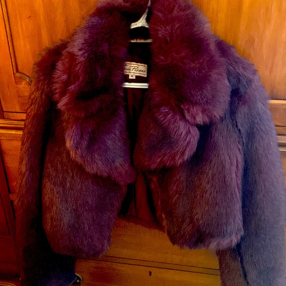 Short faux fur jacket.